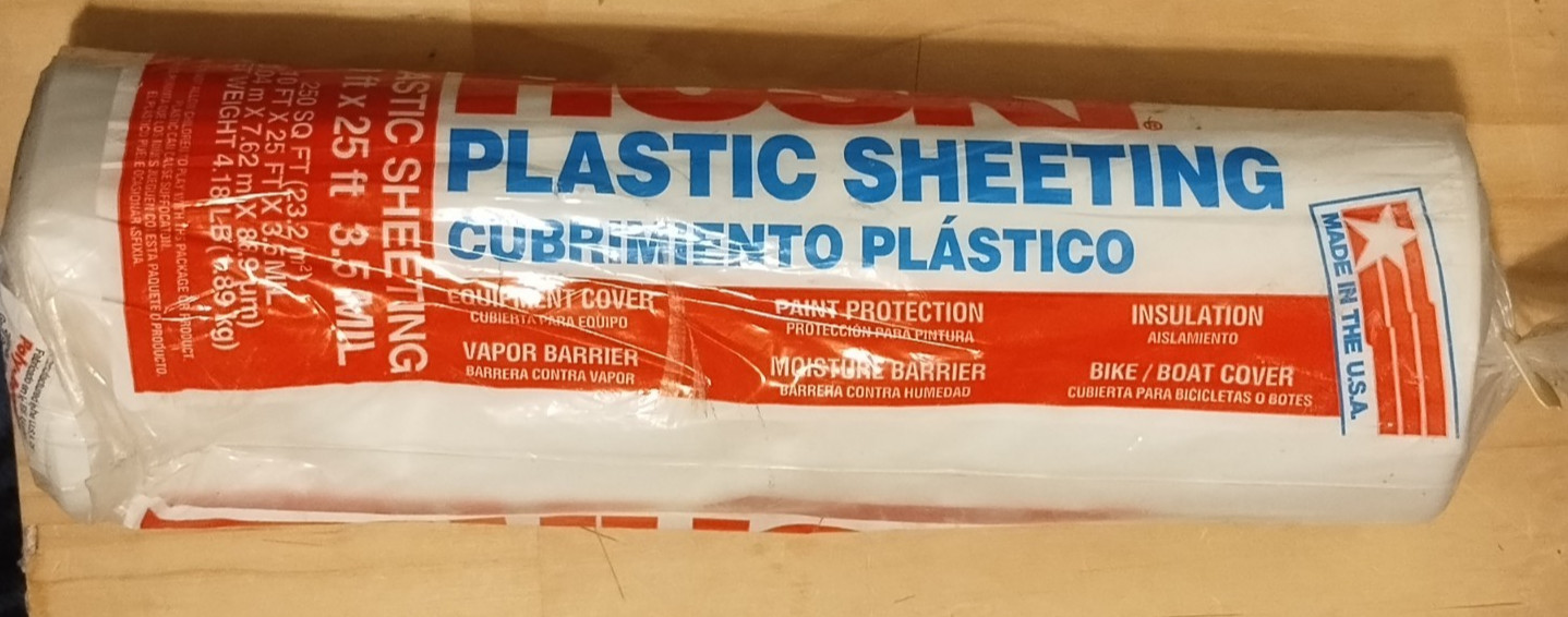 Husky 3.5 Mil Clear Plastic Sheeting roll, measuring 10 feet by 25 feet